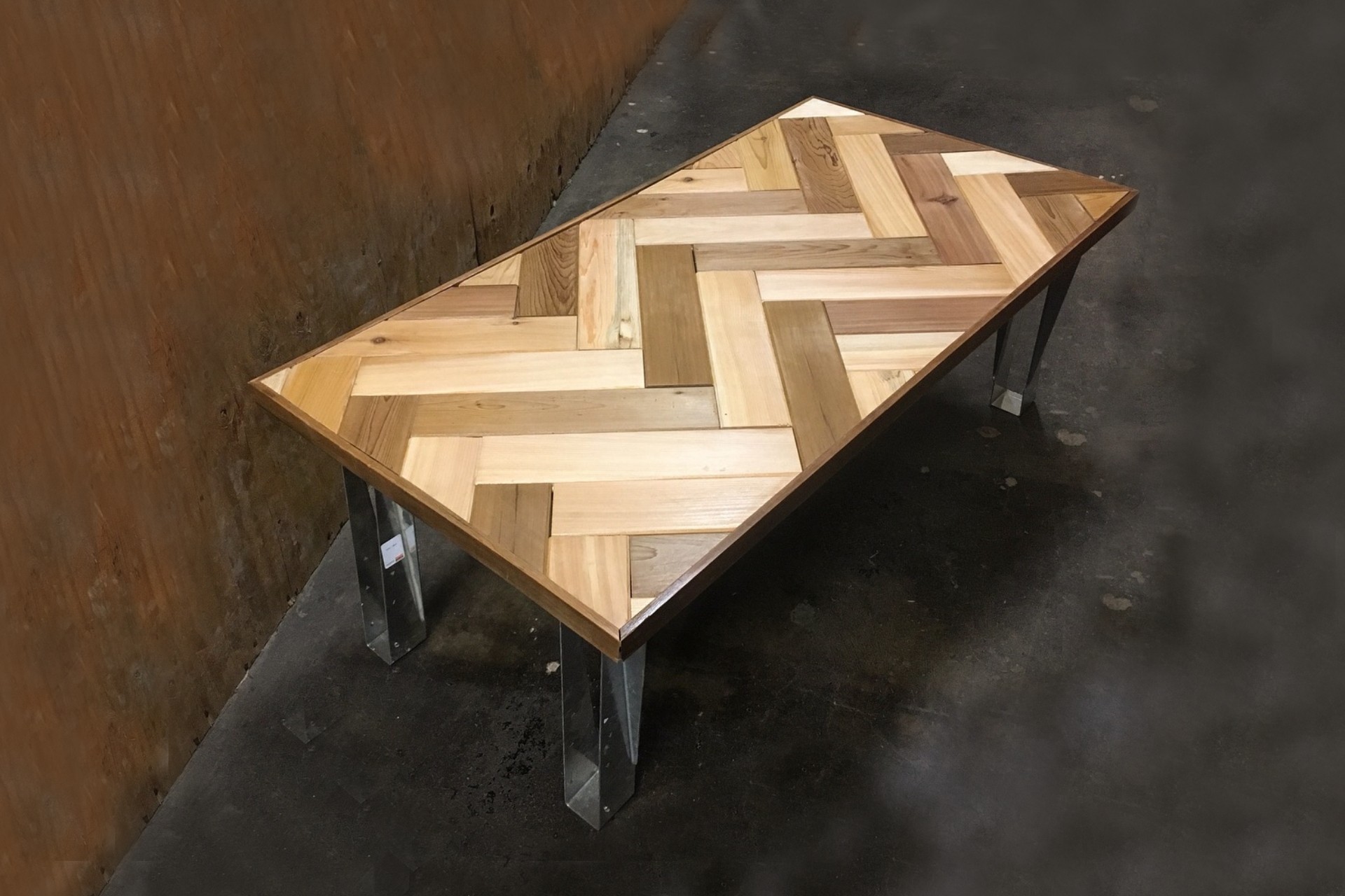 Link image of french herringbone coffee table